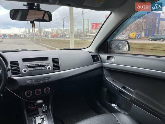 Серый Мицубиси Лансер, объемом двигателя 2 л и пробегом 248 тыс. км за 6100 $, фото 21 на Automoto.ua