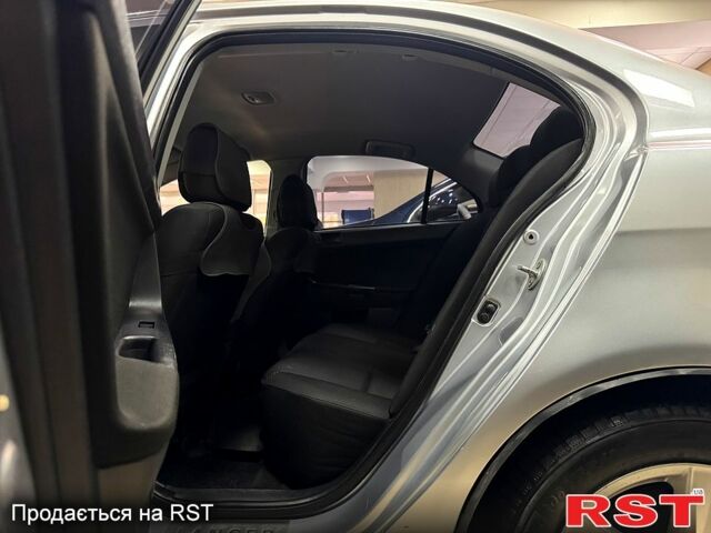 Серый Мицубиси Лансер, объемом двигателя 1.5 л и пробегом 241 тыс. км за 6400 $, фото 7 на Automoto.ua