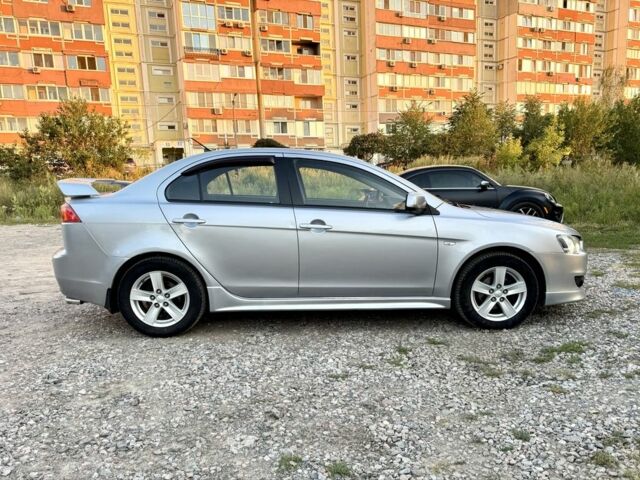 Сірий Міцубісі Lancer, об'ємом двигуна 2 л та пробігом 223 тис. км за 6890 $, фото 6 на Automoto.ua