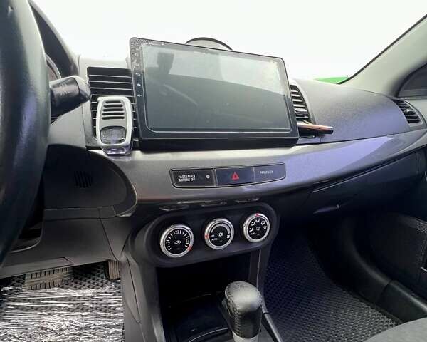 Серый Мицубиси Лансер, объемом двигателя 2 л и пробегом 203 тыс. км за 4999 $, фото 16 на Automoto.ua