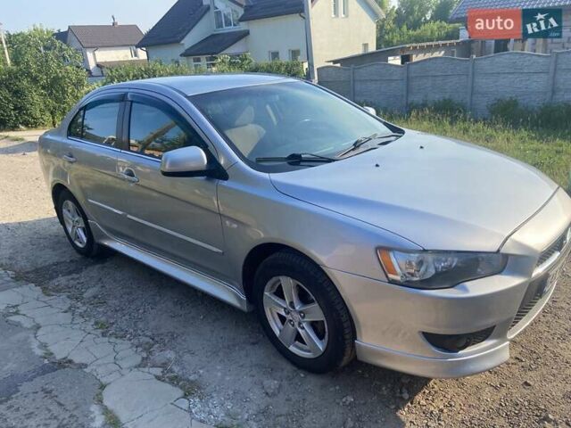 Серый Мицубиси Лансер, объемом двигателя 2 л и пробегом 266 тыс. км за 7000 $, фото 2 на Automoto.ua