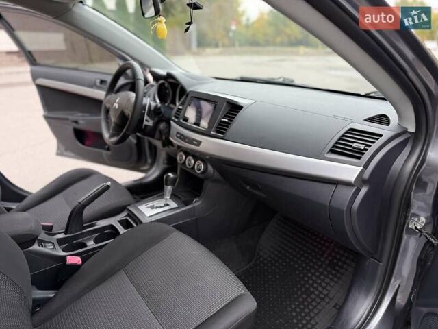 Мицубиси Лансер 2008 в Днепре (Днепропетровске) на Automoto.ua Серый Мицубиси Лансер, объемом двигателя 2 л и пробегом 152 тыс. км за 7999 $, фото 33 на Automoto.ua
