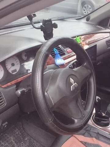 Сірий Міцубісі Lancer, об'ємом двигуна 1.58 л та пробігом 323 тис. км за 3300 $, фото 13 на Automoto.ua