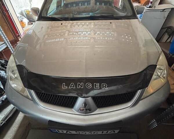 Мицубиси Лансер 2008 в Кропивницком (Кировограде) на Automoto.ua Серый Мицубиси Лансер, объемом двигателя 1.58 л и пробегом 175 тыс. км за 2000 $, фото 4 на Automoto.ua