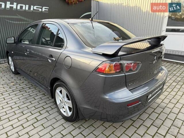 Серый Мицубиси Лансер, объемом двигателя 2 л и пробегом 230 тыс. км за 6900 $, фото 23 на Automoto.ua