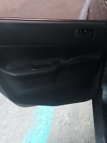 Сірий Міцубісі Lancer, об'ємом двигуна 1.58 л та пробігом 323 тис. км за 3300 $, фото 8 на Automoto.ua