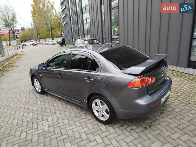 Міцубісі Lancer 2008 у Хмельницькому на Automoto.ua Сірий Міцубісі Lancer, об'ємом двигуна 2 л та пробігом 157 тис. км за 6300 $, фото 5 на Automoto.ua
