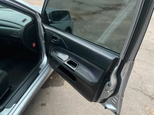 Сірий Міцубісі Lancer, об'ємом двигуна 1.6 л та пробігом 254 тис. км за 3800 $, фото 14 на Automoto.ua