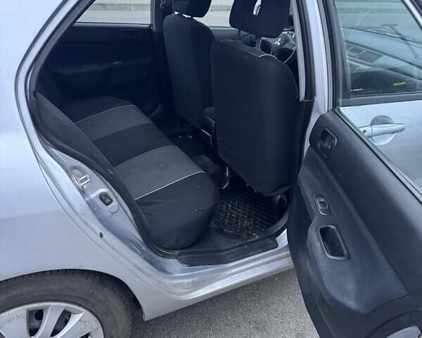 Серый Мицубиси Лансер, объемом двигателя 1.58 л и пробегом 330 тыс. км за 3500 $, фото 12 на Automoto.ua