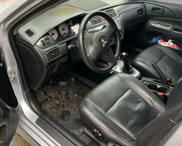 Мицубиси Лансер 2008 в Владимир-Волынский на Automoto.ua Серый Мицубиси Лансер, объемом двигателя 1.4 л и пробегом 268 тыс. км за 3700 $, фото 10 на Automoto.ua