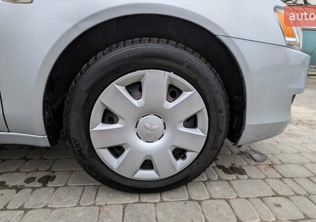 Серый Мицубиси Лансер, объемом двигателя 1.5 л и пробегом 147 тыс. км за 6700 $, фото 10 на Automoto.ua