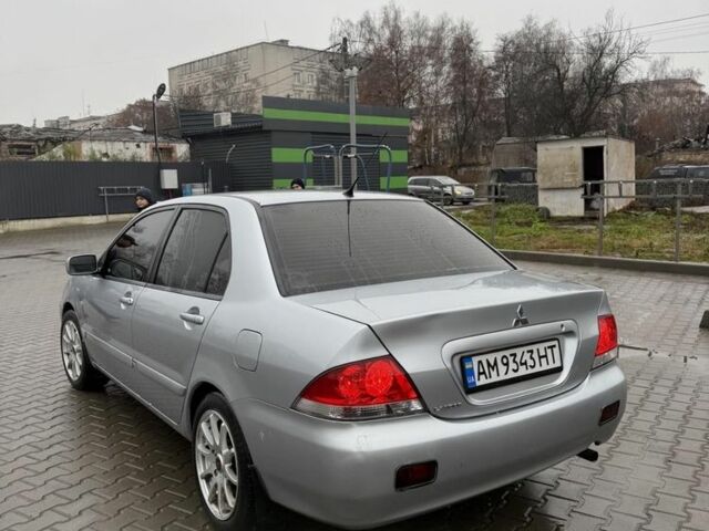 Серый Мицубиси Лансер, объемом двигателя 1.6 л и пробегом 158 тыс. км за 3150 $, фото 2 на Automoto.ua