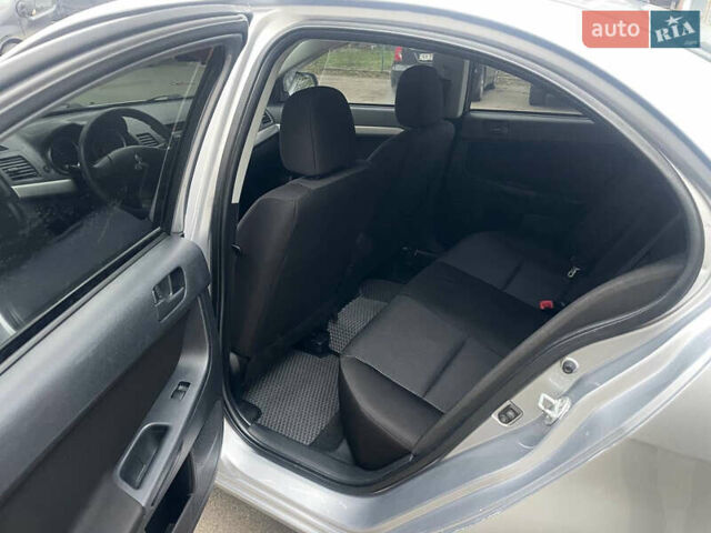 Сірий Міцубісі Lancer, об'ємом двигуна 1.5 л та пробігом 177 тис. км за 5999 $, фото 11 на Automoto.ua
