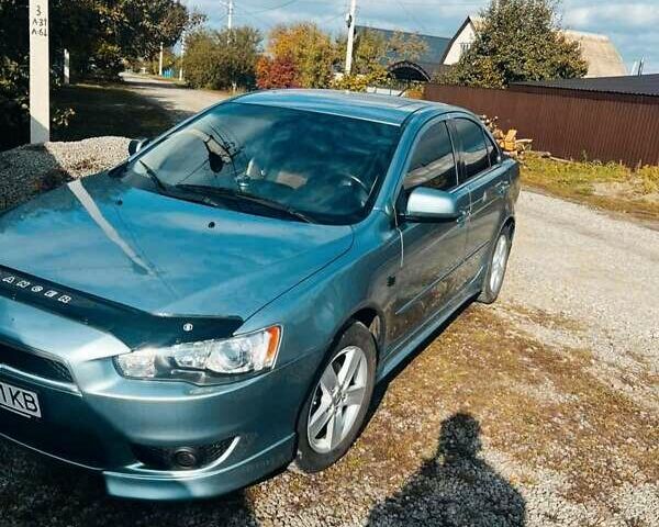 Сірий Міцубісі Lancer, об'ємом двигуна 2 л та пробігом 212 тис. км за 7300 $, фото 7 на Automoto.ua