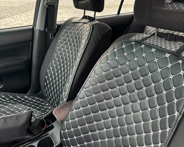 Серый Мицубиси Лансер, объемом двигателя 1.6 л и пробегом 222 тыс. км за 5200 $, фото 13 на Automoto.ua