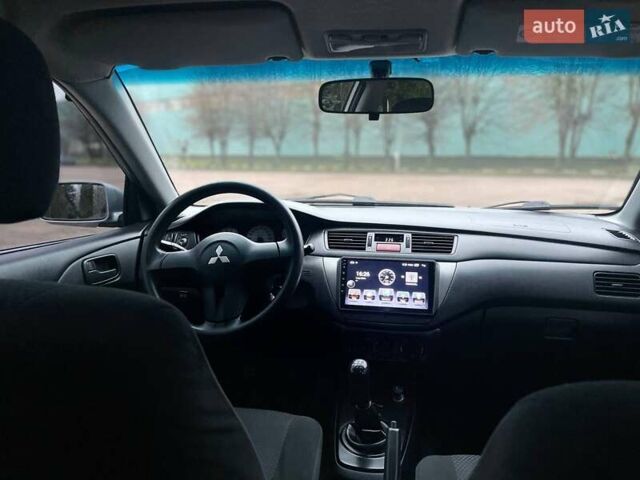 Сірий Міцубісі Lancer, об'ємом двигуна 1.6 л та пробігом 254 тис. км за 3800 $, фото 15 на Automoto.ua