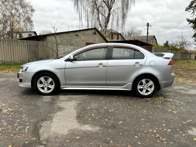 Серый Мицубиси Лансер, объемом двигателя 2 л и пробегом 225 тыс. км за 6890 $, фото 3 на Automoto.ua