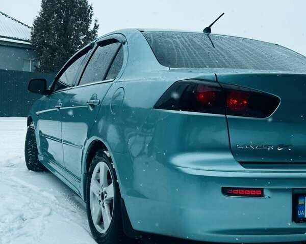 Сірий Міцубісі Lancer, об'ємом двигуна 2 л та пробігом 213 тис. км за 7300 $, фото 2 на Automoto.ua