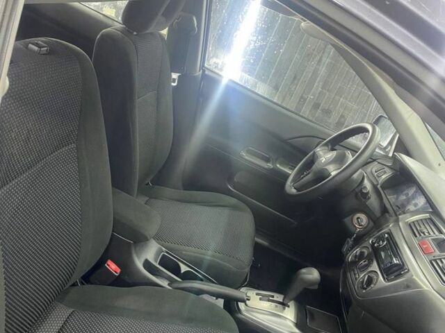 Серый Мицубиси Лансер, объемом двигателя 1.6 л и пробегом 100 тыс. км за 2500 $, фото 6 на Automoto.ua