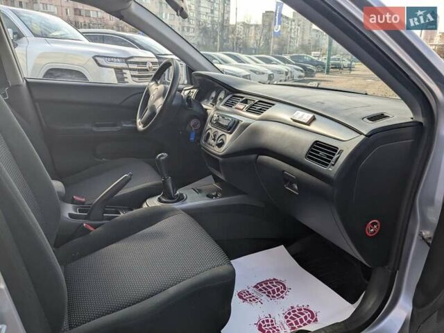 Серый Мицубиси Лансер, объемом двигателя 1.6 л и пробегом 155 тыс. км за 5200 $, фото 24 на Automoto.ua