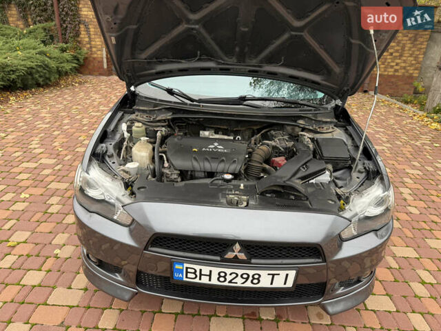 Сірий Міцубісі Lancer, об'ємом двигуна 2 л та пробігом 92 тис. км за 8200 $, фото 44 на Automoto.ua