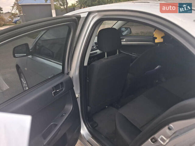 Сірий Міцубісі Lancer, об'ємом двигуна 1.8 л та пробігом 255 тис. км за 6999 $, фото 8 на Automoto.ua