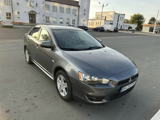 Сірий Міцубісі Lancer, об'ємом двигуна 2 л та пробігом 219 тис. км за 6700 $, фото 2 на Automoto.ua