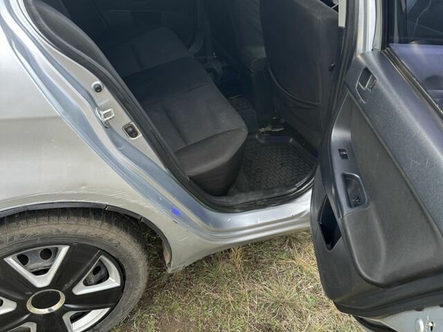 Серый Мицубиси Лансер, объемом двигателя 1.5 л и пробегом 321 тыс. км за 3900 $, фото 8 на Automoto.ua