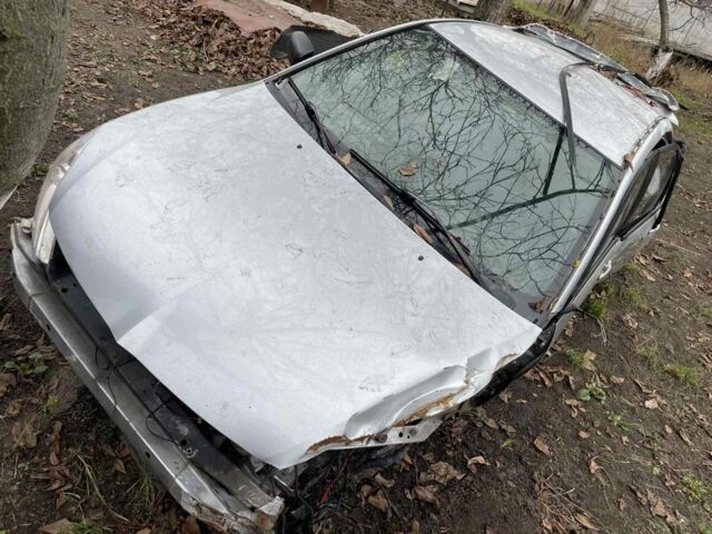 Серый Мицубиси Лансер, объемом двигателя 1.6 л и пробегом 280 тыс. км за 900 $, фото 1 на Automoto.ua