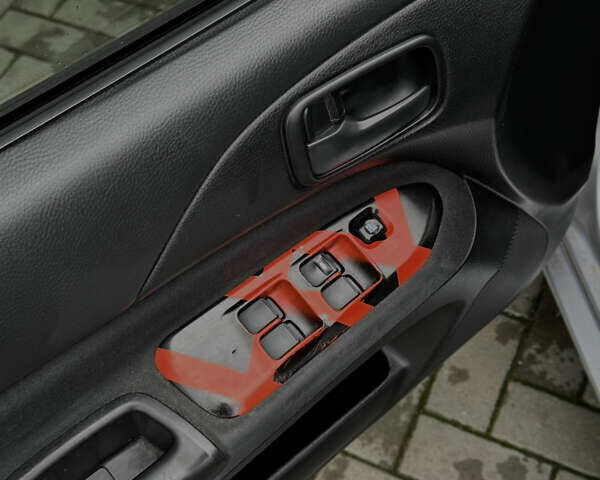 Сірий Міцубісі Lancer, об'ємом двигуна 1.6 л та пробігом 269 тис. км за 3999 $, фото 23 на Automoto.ua