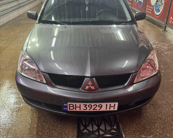 Серый Мицубиси Лансер, объемом двигателя 1.6 л и пробегом 268 тыс. км за 4600 $, фото 3 на Automoto.ua