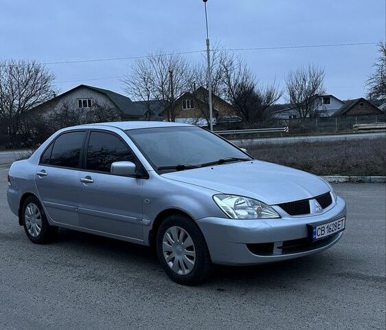 Сірий Міцубісі Lancer, об'ємом двигуна 1.6 л та пробігом 180 тис. км за 3900 $, фото 1 на Automoto.ua