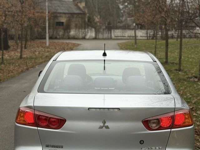 Сірий Міцубісі Lancer, об'ємом двигуна 2 л та пробігом 265 тис. км за 5300 $, фото 5 на Automoto.ua