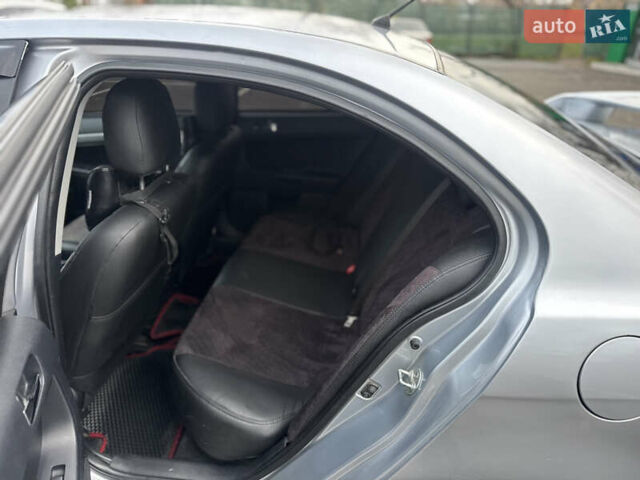 Сірий Міцубісі Lancer, об'ємом двигуна 2 л та пробігом 104 тис. км за 5999 $, фото 4 на Automoto.ua