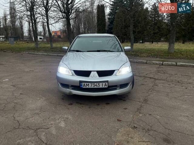 Сірий Міцубісі Lancer, об'ємом двигуна 1.6 л та пробігом 254 тис. км за 3800 $, фото 1 на Automoto.ua