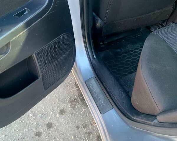 Серый Мицубиси Лансер, объемом двигателя 1.5 л и пробегом 160 тыс. км за 5300 $, фото 7 на Automoto.ua