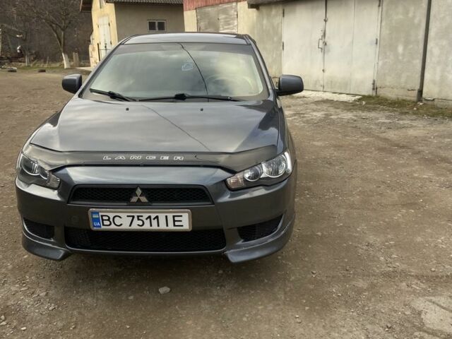 Сірий Міцубісі Lancer, об'ємом двигуна 2 л та пробігом 220 тис. км за 5750 $, фото 6 на Automoto.ua