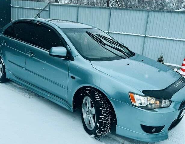 Сірий Міцубісі Lancer, об'ємом двигуна 2 л та пробігом 213 тис. км за 7300 $, фото 4 на Automoto.ua