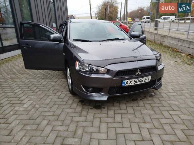 Міцубісі Lancer 2008 у Хмельницькому на Automoto.ua Сірий Міцубісі Lancer, об'ємом двигуна 2 л та пробігом 157 тис. км за 6300 $, фото 30 на Automoto.ua