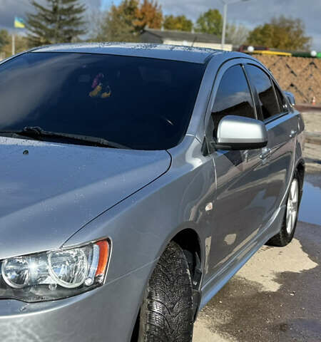 Серый Мицубиси Лансер, объемом двигателя 2 л и пробегом 190 тыс. км за 6900 $, фото 9 на Automoto.ua