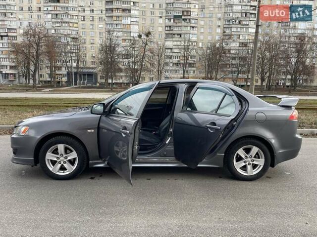 Серый Мицубиси Лансер, объемом двигателя 2 л и пробегом 248 тыс. км за 6100 $, фото 4 на Automoto.ua