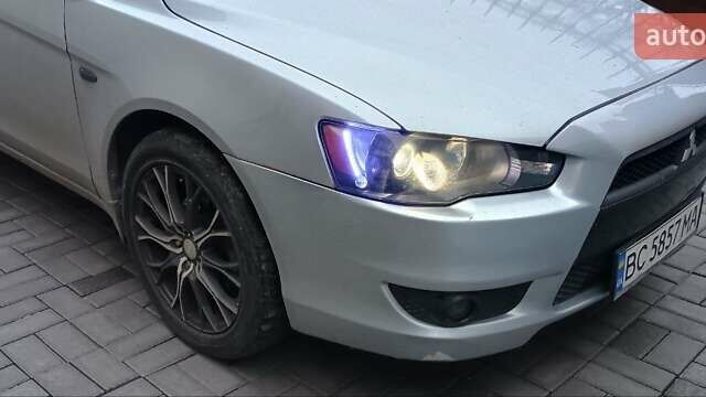 Серый Мицубиси Лансер, объемом двигателя 1.5 л и пробегом 230 тыс. км за 6300 $, фото 7 на Automoto.ua