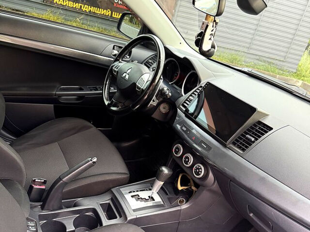 Сірий Міцубісі Lancer, об'ємом двигуна 2 л та пробігом 180 тис. км за 7600 $, фото 10 на Automoto.ua