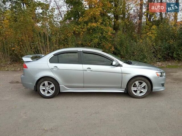 Сірий Міцубісі Lancer, об'ємом двигуна 2 л та пробігом 189 тис. км за 6850 $, фото 2 на Automoto.ua