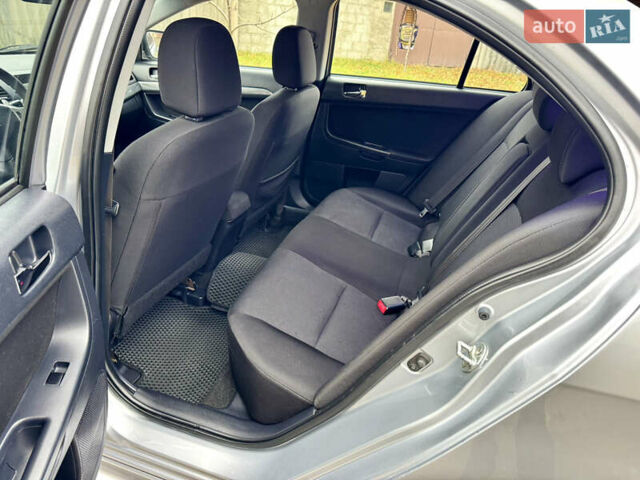 Сірий Міцубісі Lancer, об'ємом двигуна 2 л та пробігом 225 тис. км за 6890 $, фото 11 на Automoto.ua