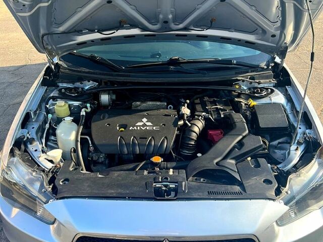 Серый Мицубиси Лансер, объемом двигателя 2 л и пробегом 151 тыс. км за 6099 $, фото 7 на Automoto.ua