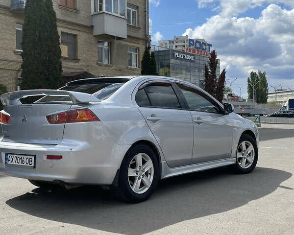 Серый Мицубиси Лансер, объемом двигателя 2 л и пробегом 265 тыс. км за 5500 $, фото 4 на Automoto.ua