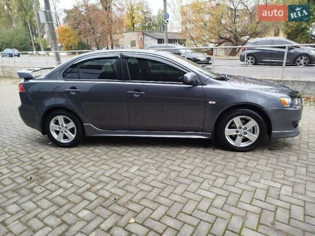 Міцубісі Lancer 2008 у Хмельницькому на Automoto.ua Сірий Міцубісі Lancer, об'ємом двигуна 2 л та пробігом 157 тис. км за 6300 $, фото 7 на Automoto.ua