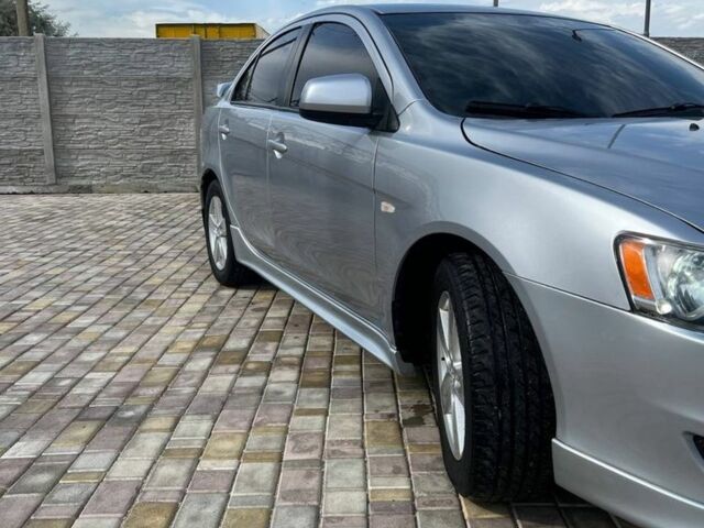 Сірий Міцубісі Lancer, об'ємом двигуна 2 л та пробігом 238 тис. км за 6400 $, фото 2 на Automoto.ua