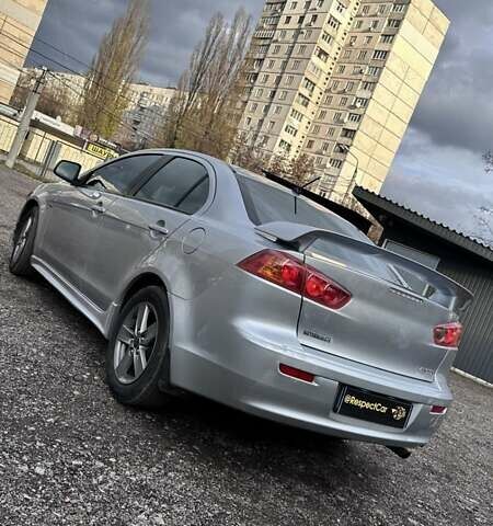 Сірий Міцубісі Lancer, об'ємом двигуна 2 л та пробігом 210 тис. км за 7100 $, фото 4 на Automoto.ua